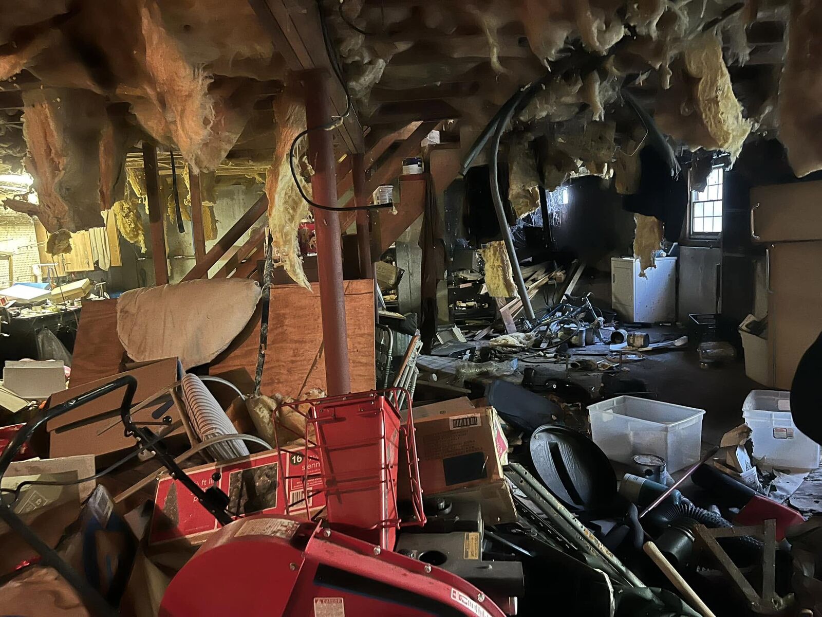 Before: basement packed with junk, equipment and debris